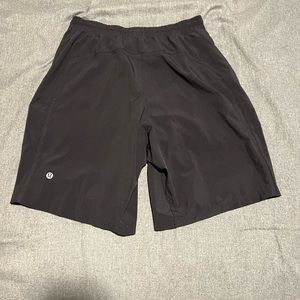 COPY - LULULEMON BLACK LINED PACE BREAKER SHORTS 9”
